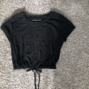 Super cute black top with tie in the front